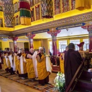 Offering representations of enlightened body, speech and mind to His Holiness Sakya Trichen Dorje Chang.